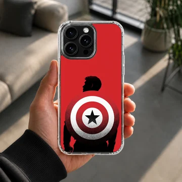 Captain America shield silhouette graphic on a vibrant red background phone case — Lifestyle