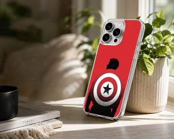 Captain America shield silhouette graphic on a vibrant red background phone case — Lifestyle
