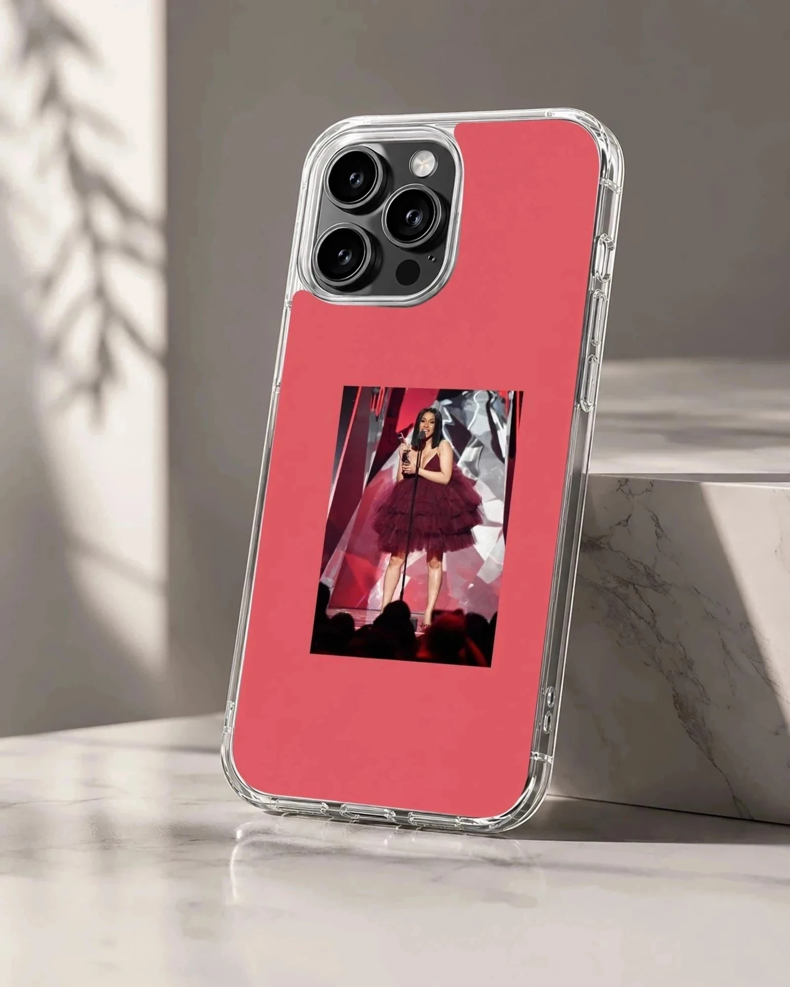 Cardi B performing on stage in a voluminous red dress phone case