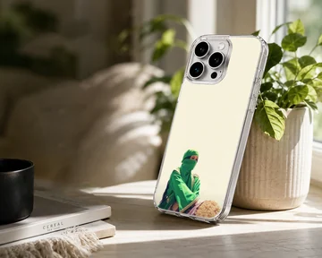A photographic music icon print in green apparel against a light backdrop on a phone case — Lifestyle