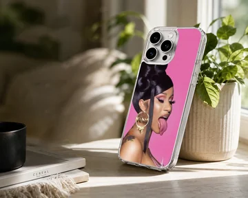 A vibrant pink portrait phone case featuring a woman with dark hair and a gold hoop earring — Lifestyle
