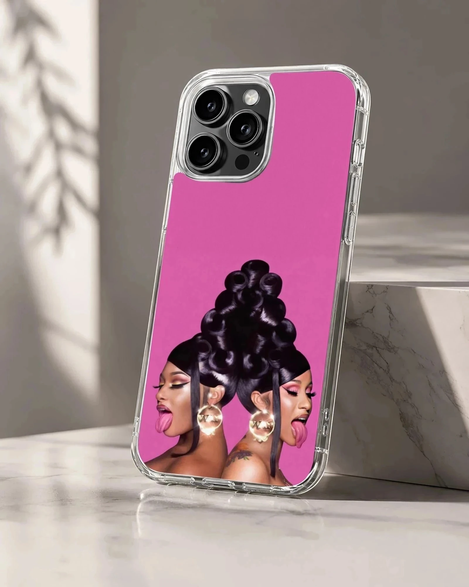 Cardi B musical icon graphic against a bright pink background on a phone case