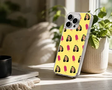 A repeat pattern phone case featuring stylized illustrations of a female rapper and pink popsicles on a yellow background — Lifestyle