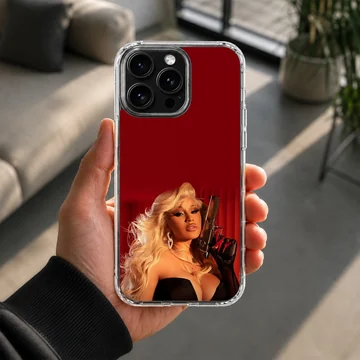 Glamorous portrait of a blonde diva holding a firearm against a rich red background phone case — Lifestyle