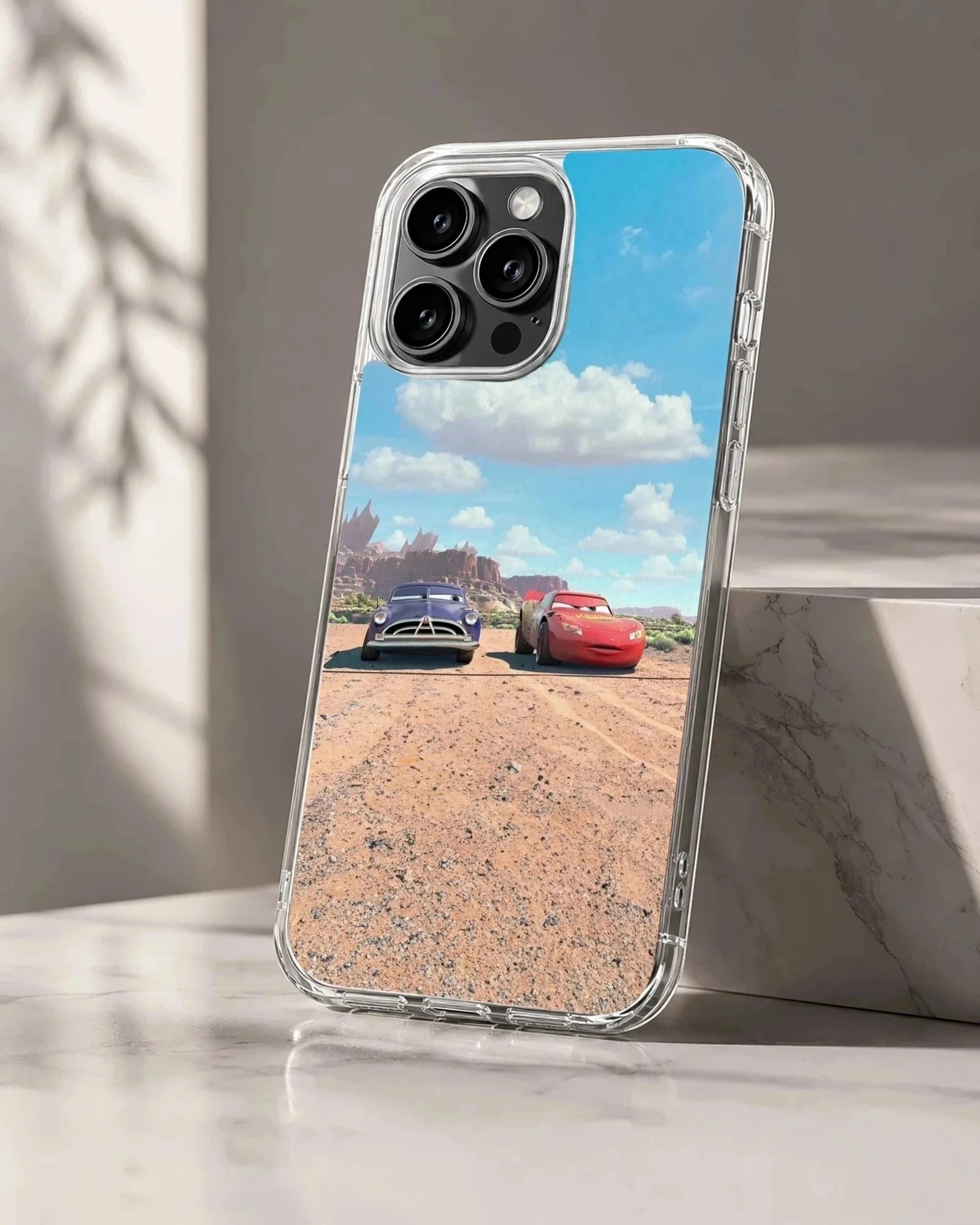 Red and purple race cars facing off on a dirt track under a blue sky phone case