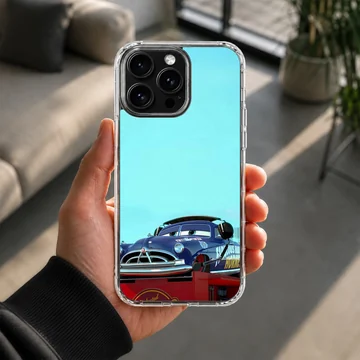Vintage race car art in deep blue against a light blue sky on a phone case — Lifestyle