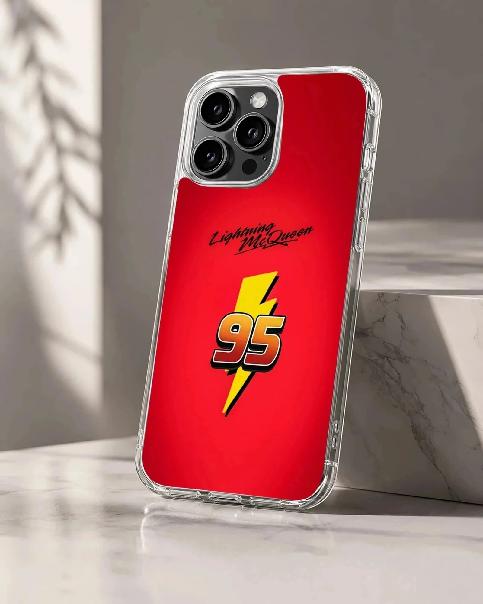 Bright red phone case featuring the number 95 over a yellow lightning bolt and racing typography