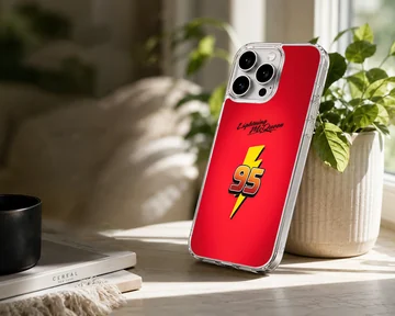 Bright red phone case featuring the number 95 over a yellow lightning bolt and racing typography — Lifestyle