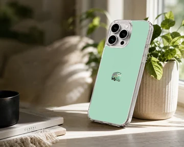 Minimalist green vintage van graphic centered on a solid mint green background phone case — Lifestyle