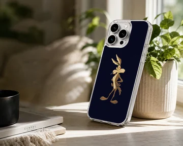 A classic cartoon character coyote stands against a dark background on a phone case. — Lifestyle