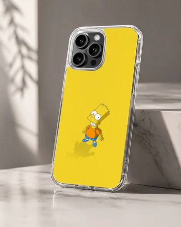 A vibrant yellow phone case featuring a classic animated boy character illustration, shown on a marble surface. — Hero