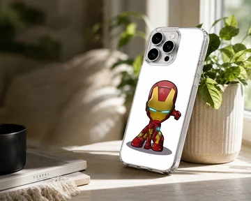 Chibi armored superhero character in a red and gold suit crouched on a phone case — Lifestyle