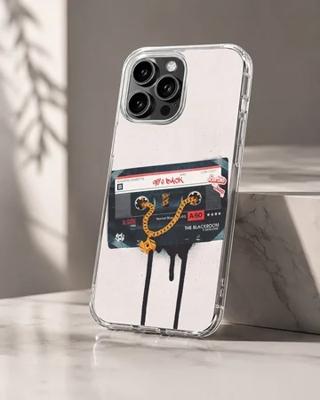 Vintage cassette tape graphic with a gold chain dripping onto a white background phone case — Hero
