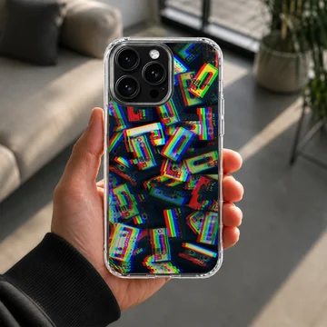 Colorful retro cassette tapes arranged in a glitch art pattern on a protective phone case — Lifestyle