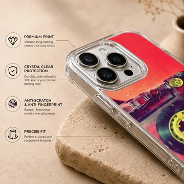 Close-up photograph of a vintage translucent red cassette tape with yellow reels on a phone case — Info