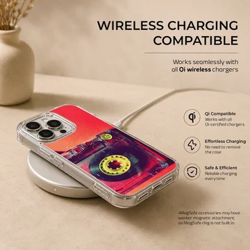 Close-up photograph of a vintage translucent red cassette tape with yellow reels on a phone case — Charging