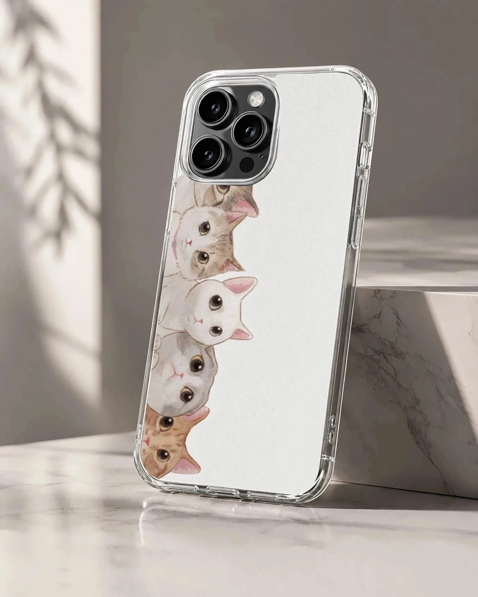 An illustrated stack of adorable cartoon cats peeking out against a clean white background on a phone case