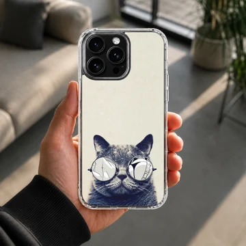A close-up of a furry cat wearing round sunglasses on a phone case — Lifestyle