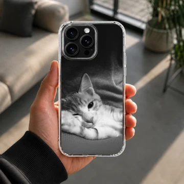 Monochrome photographic print of a sleepy resting cat on a matte phone case — Lifestyle