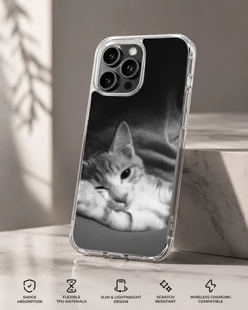 Monochrome photographic print of a sleepy resting cat on a matte phone case — Specs