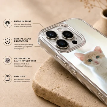 Close-up photographic print of a small white and ginger kitten sitting attentively on a light floor for a phone case — Info