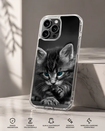Close-up black and white photograph of a fluffy kitten with striking blue eyes on a phone case — Specs