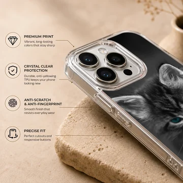 Close-up black and white photograph of a fluffy kitten with striking blue eyes on a phone case — Info