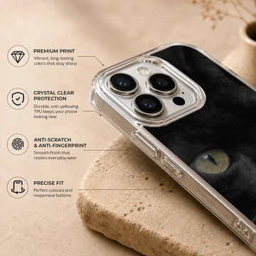 Close-up portrait of a sleek black cat with glowing green-yellow eyes printed on a phone case — Info
