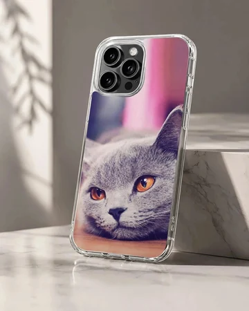 Close-up photographic print of a grey cat with bright amber eyes on a phone case