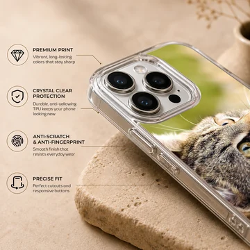 Close-up photographic print of a curious tabby cat looking upward on a phone case — Info