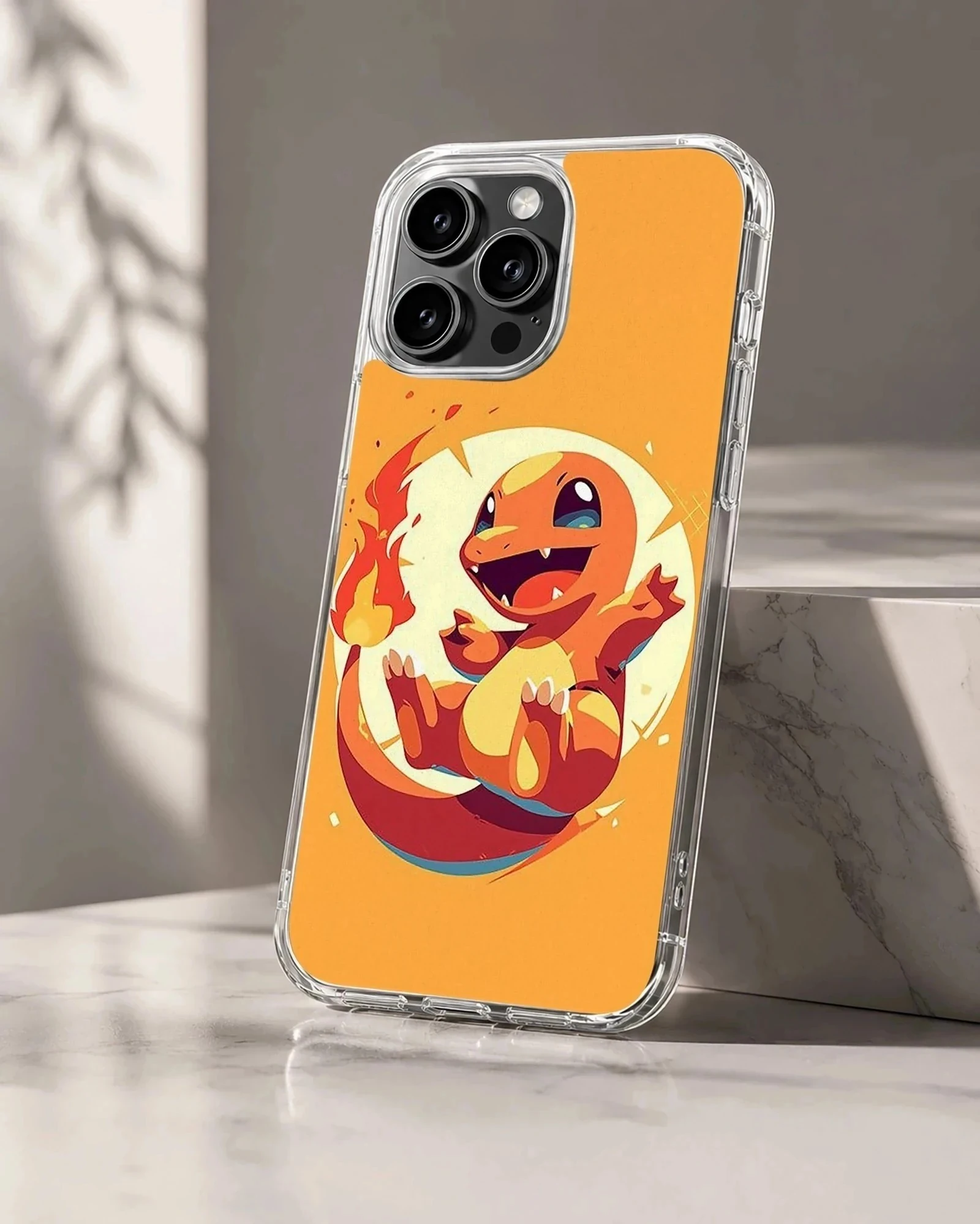 Vibrant orange digital illustration of a cheerful fire dragon character with a glowing flame tail on a phone case