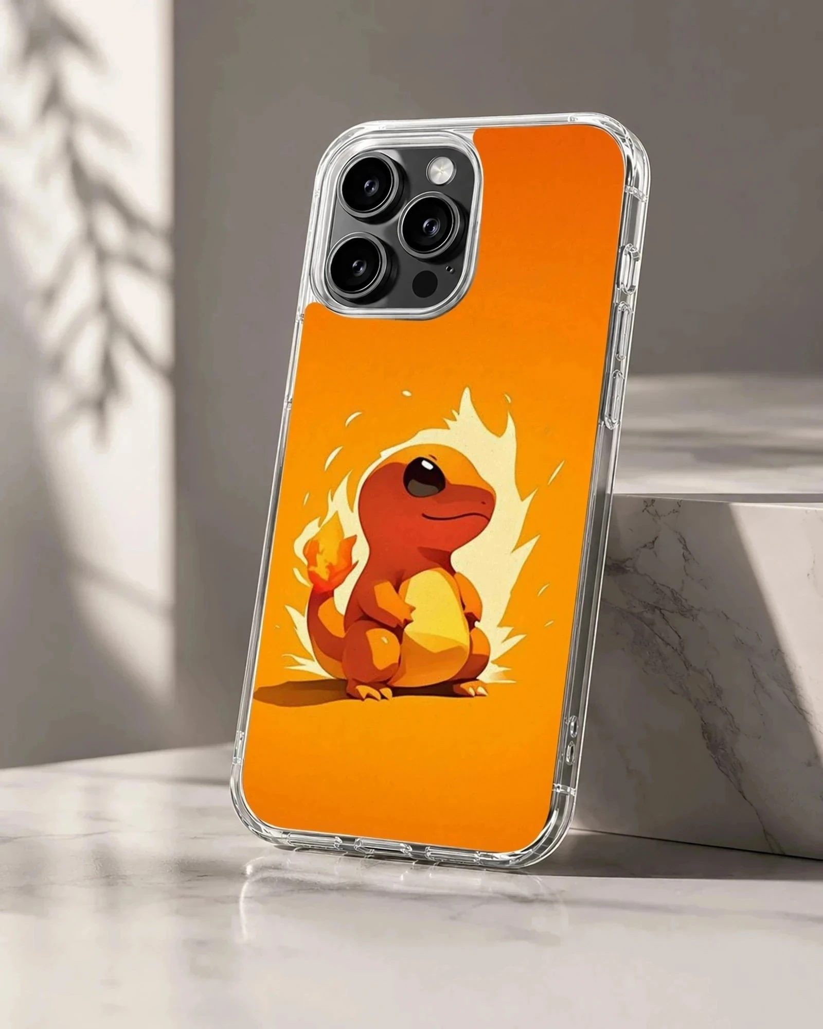 An orange anime fire dragon character with a glowing flame tail on a phone case