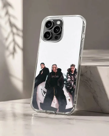 Chase Atlantic band members posing with a supercar phone case