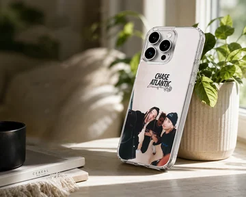 Chase Atlantic band members in a group photo with a rose logo above on a phone case — Lifestyle