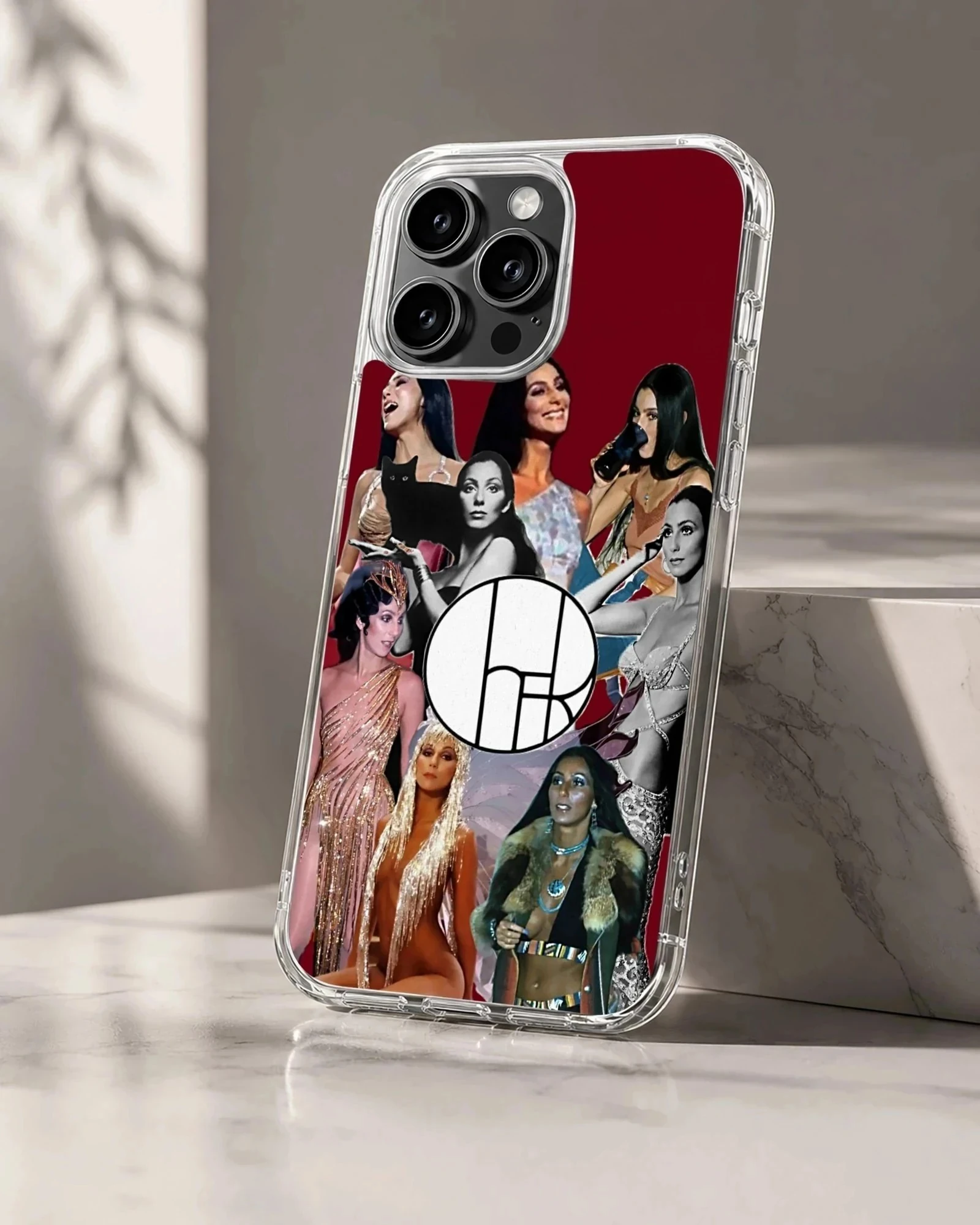 Vintage photo collage of music icon Cher in various legendary outfits on a red phone case