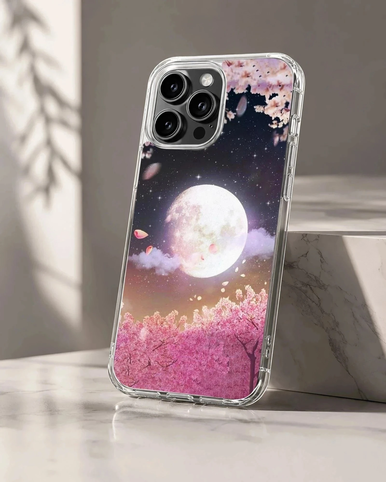 Digital illustration of a glowing full moon over pink cherry blossom trees at night on a phone case