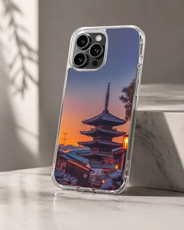 Chinese temple pagoda silhouetted against a vibrant sunset sky on a phone case — Hero
