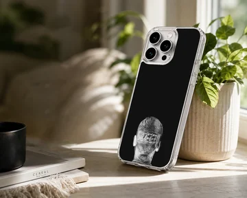 Monochrome portrait artwork showing the back of a head with detailed tattoos on a phone case — Lifestyle