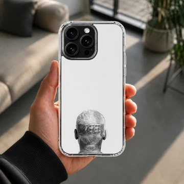 Monochrome photographic print of the back of a head with tattoos and neck lettering on a phone case — Lifestyle