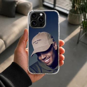 Chris Brown smiling portrait wearing a beige cap phone case — Lifestyle