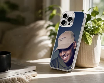 Chris Brown smiling portrait wearing a beige cap phone case — Lifestyle
