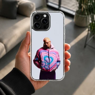 Chris Brown in a colorful pink and blue heart puffer jacket on a phone case — Lifestyle