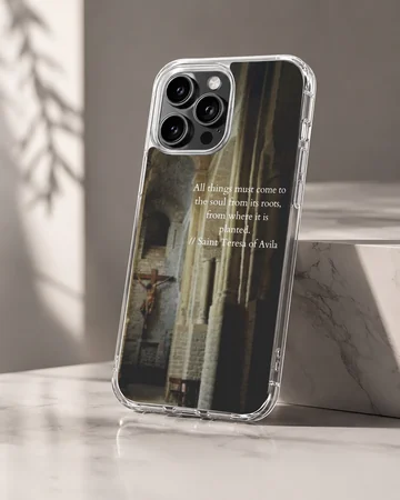 Saint Teresa quote printed over a dimly lit interior stone archway on a phone case — Hero
