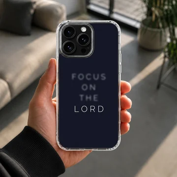 Dark navy phone case with minimalist typography reading Focus on the Lord phone case — Lifestyle