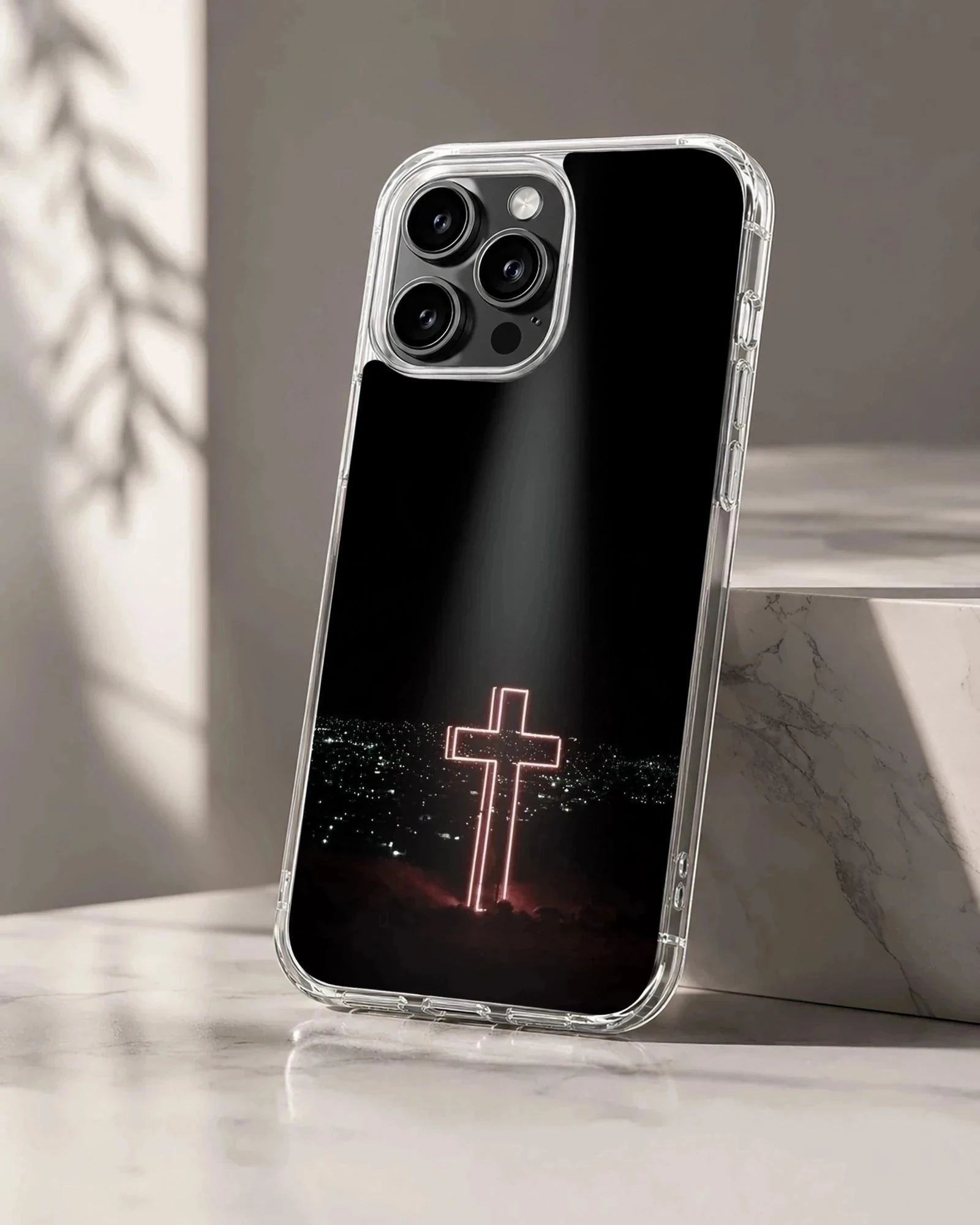 Glowing neon cross design against a dark city background on a phone case