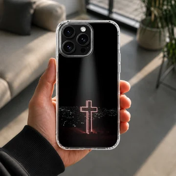 Glowing neon cross design against a dark city background on a phone case — Lifestyle