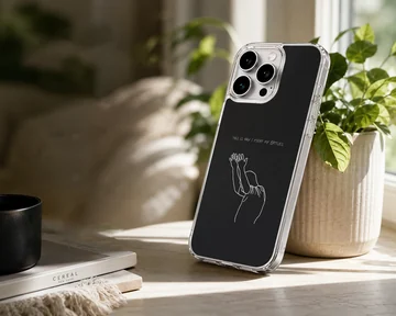Minimalist white line art of hands raised in worship with Christian typography on a black matte phone case — Lifestyle