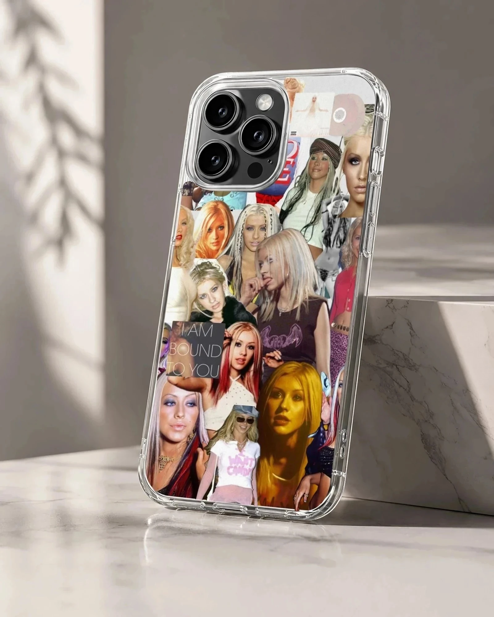 A photo collage phone case featuring pop music memorabilia and portraits of a female singer