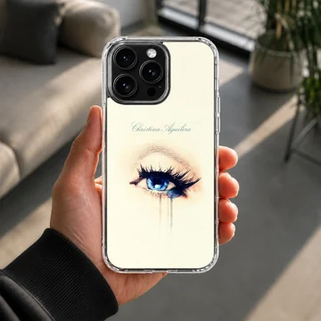 Detailed artwork of a striking blue eye with long lashes on a phone case — Lifestyle
