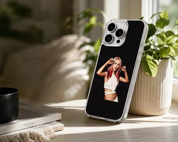 Pop icon portrait with red highlighted hair and white outfit on a black background phone case — Lifestyle